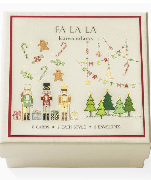 Box of Fa La La Gift Enclosures by Karen Adams, featuring hand-glittered nutcrackers, trees, candy canes, ornaments, and a "Merry Christmas" banner. Includes 8 cards and 8 envelopes.