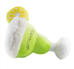 The Haute Diggity Dog Muttgarita Plush Toy is a green and white margarita-shaped dog toy with a faux lemon slice, fun squeaker, and "MUTTCARITA" embroidery—ideal for playful pups!.
