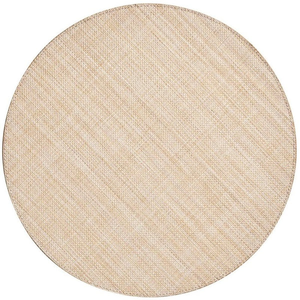 A round, beige textured Kim Seybert Portofino Placemat on a white background, woven vinyl and easy to clean.