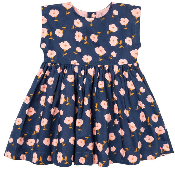 The navy Pink Chicken Girls' Adaline Dress features delicate pink flowers perfect for Fall.