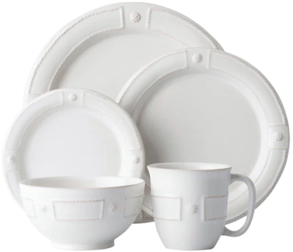 The Juliska Berry & Thread French Panel Dinnerware Collection includes a bowl, mug, salad plate, and dinner plate featuring raised rope and dot details inspired by Parisian architecture along the rims.