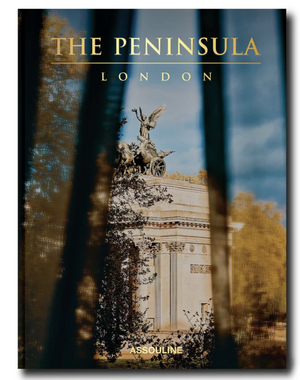 Assouline’s "The Peninsula London" features a cover photo of a winged monument framed by drapes, capturing the refined elegance of this iconic London luxury hotel.