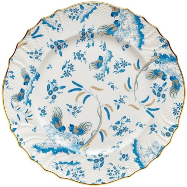 A decorative plate featuring blue floral and bird patterns with a gold rim, from the GINORI 1735 Oro Di Doccia Turchese collection by Ginori 1735.