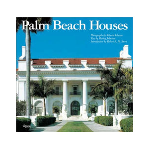 The cover of "Palm Beach Houses" by Rizzoli displays a beautiful white mansion with columns, surrounded by lush palms and under a vivid blue sky—highlighting the classic Mediterranean-inspired architecture of Palm Beach.