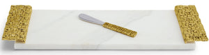 The Michael Aram Palm Cheese Board with Spreader features a rectangular white marble tray with textured antique goldtone handles and comes with a matching gold-handled spreader.