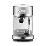 The Breville Bambino Plus Espresso Machine, shown front-facing on a white background, features control buttons, a portafilter, ThermoJet heating, automatic steam wand, and drip tray—ideal for specialty coffee lovers.
