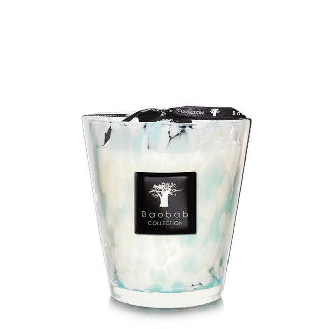 Baobab Pearls Sapphire candle in a decorative hand-blown glass jar with a marbled white and turquoise pattern, isolated on a white background.