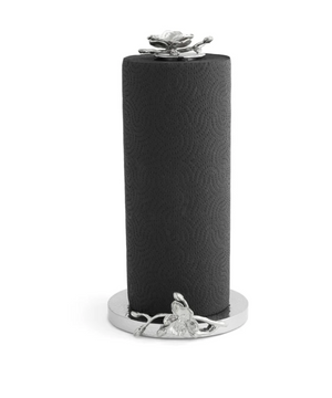 The Michael Aram White Orchid Paper Towel Holder features a white paper towel roll on a silver metal holder, accented with floral decorations inspired by the elegance and purity of orchids.