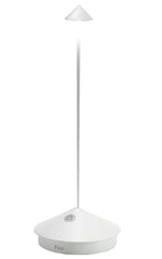 The Zafferano America Pina Lamp Collection features modern, minimalist white desk lamps with a conical shade and slender stem, offering touch dimming and portability for versatile indoor or outdoor use.