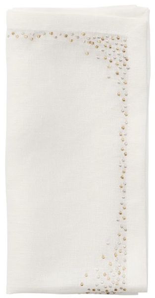 White linen scarf with delicate gold bead embellishments and Kim Seybert Pin Dot Napkin Collection details along one edge.
