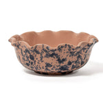 The Sharland England Splatter Scallop Dish Collection features ceramic scallop dishes with wavy rims, a brown base, and black splatter design—ideal for storing trinkets.