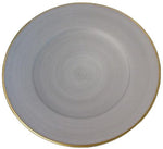 A plain white ceramic charger plate with a gold border from Anna Weatherley’s Charger Collection, viewed from above and exuding timeless elegance.