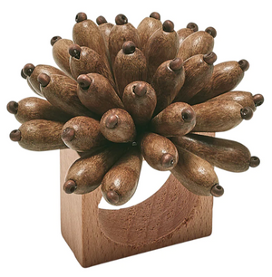 The Kim Seybert Florette Brown Napkin Ring features a square base and clustered wooden beads that evoke flower petals—an ideal accent to elevate your outdoor gatherings.
