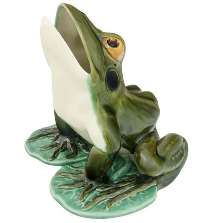 Add a playful touch to your garden with the Bordallo Pinheiro Large Open-Mouth Frog, a handpainted ceramic figurine perched on a green base that mimics grass or water.