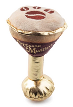 The Espresso Muttini Plush Toy by Haute Diggity Dog is a squeaky dog toy shaped like a golden coffee cup with a paw print and "Espresso Muttini" embroidered on the side, perfect for pups who love coffee culture.