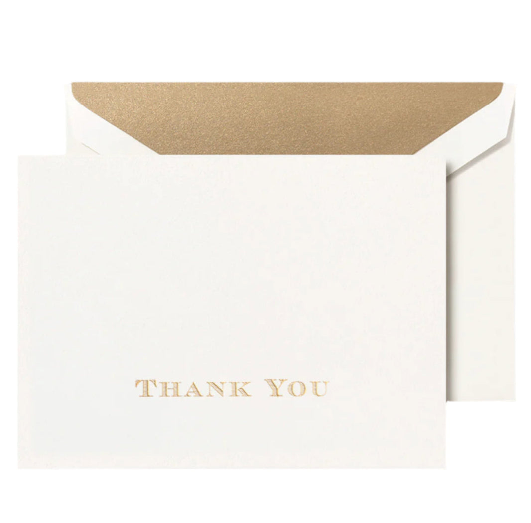 Crane's Gold Thank You Card Set features white all-cotton paper cards with gold metallic engraving and lettering, paired with matching envelopes lined in gold for an elegant touch.