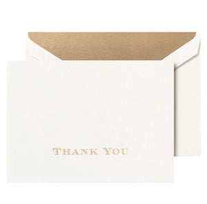 Crane's Gold Thank You Card Set features white all-cotton paper cards with gold metallic engraving and lettering, paired with matching envelopes lined in gold for an elegant touch.