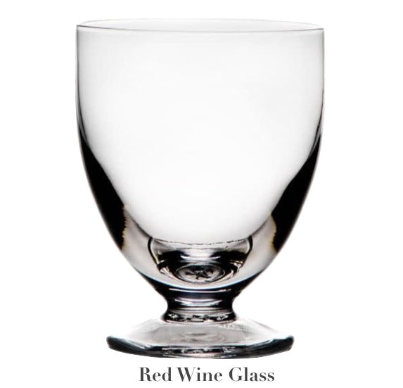 A clear, stemmed glass with a wide bowl from the Barre Drinkware Collection by Simon Pearce, featuring handmade glassblowing artistry—luxury drinkware for any occasion.