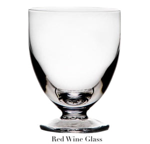 A clear, stemmed glass with a wide bowl from the Barre Drinkware Collection by Simon Pearce, featuring handmade glassblowing artistry—luxury drinkware for any occasion.