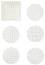 The Kim Seybert Reed White Coasters Set features six white, textured circular coasters resembling faux-wicker, with one displayed inside a clear square container in the top left corner.