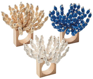 The Kim Seybert Reed Napkin Ring features square wooden bases and beads in beige, blue, and white floral designs—perfect for coastal décor. Set of three napkin rings shown on a white background.