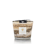 A Baobab Sand Siloli candle in a clear glass jar with beige and brown swirl design, isolated on a white background, featuring green lemon scent.