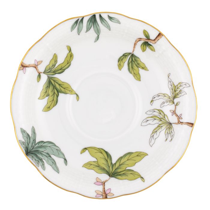 The Foret Garland Collection by Herend features a white hand-painted porcelain plate with a gold rim and artistic green leaves and branches delicately encircling the edges.