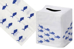 The Haute Home School of Fish Bath Collection in blue features an elegant Italian linen tissue box cover with a matching cloth, both adorned with hand-embroidered fish patterns.