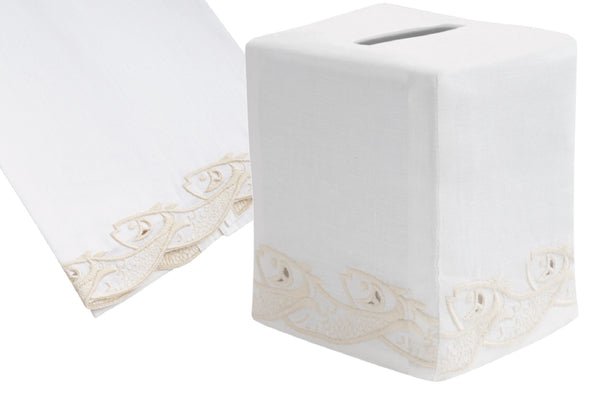 Two Scrollfish Collection, Cream linen items by Haute Home: one is a flat tablecloth with hand embroidered borders; the other, a square tissue box cover with a slot on top.