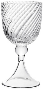 The Venetia Drinkware Collection by William Yeoward Crystal features a clear goblet with a round base, short elegant stem, and a bowl adorned with a striking diagonal swirl pattern.