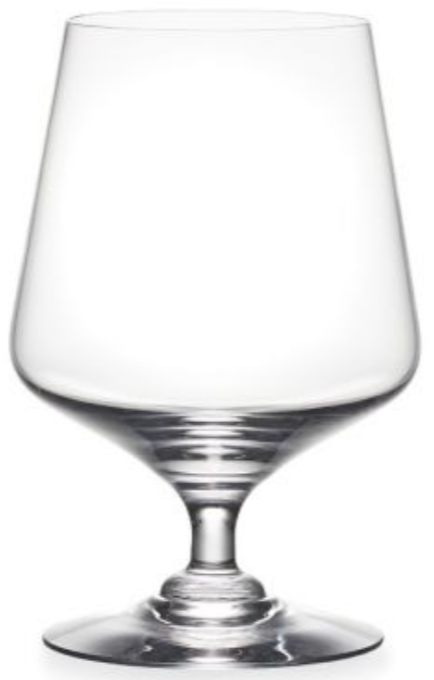 The Simon Pearce Vintner Drinkware Collection features a clear snifter glass with a wide bowl, short stem, and circular base—handblown elegance inspired by Napa Valley winemakers, shown against a plain white background.