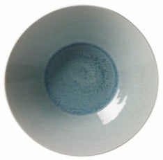 A top view of the Jars Vuelta Ocean Blue Collection bowl, featuring a light blue ceramic design, a darker blue center, and a glossy ocean-inspired glaze for timeless elegance.
