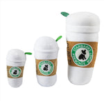 The Haute Diggity Dog Starbarks Coffee Cup Plush Dog Toy Collection features three squeaker toys shaped like coffee cups, each with a brown "Starbarks Frenchie Roast" sleeve, available in small, medium, and large sizes.