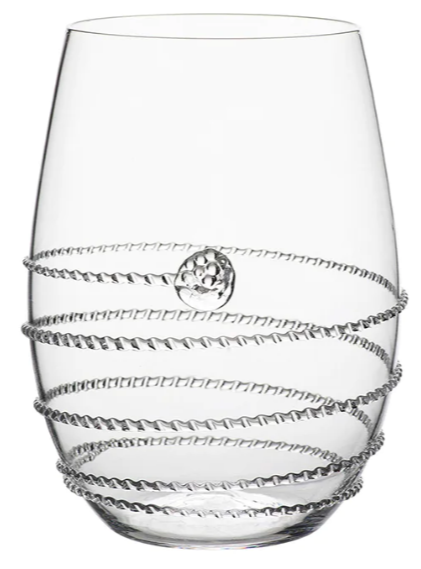 Clear glass tumbler from Juliska’s Amalia Drinkware Collection, featuring a raised spiral pattern and a small textured circular accent.