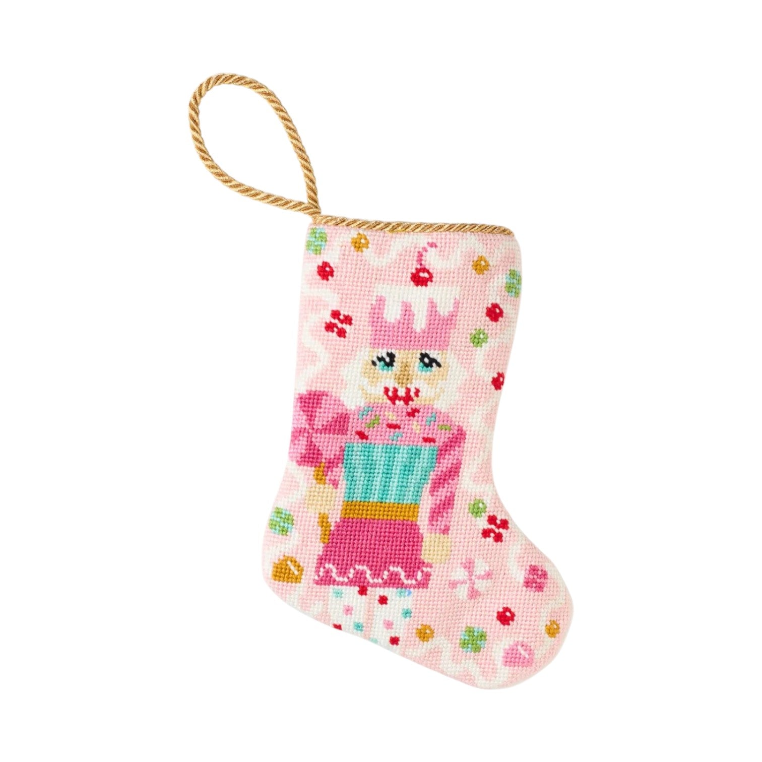 The Sugary Sweet Pink Nutcracker Needle Point Stocking by Bauble Stockings features hand-stitched details, colorful patterns, and a gold hanging loop—a charming holiday decor accent.