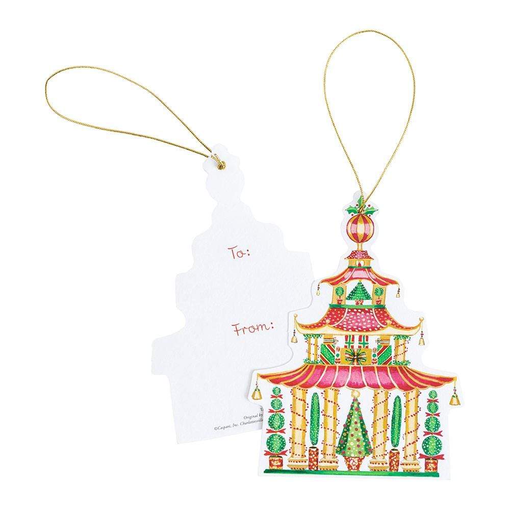 The Caspari Christmas Pagodas Gift Tag Set includes two pagoda-shaped die-cut tags with gold string—one with a festive ornament design, the other with "To:" and "From:" sections on premium white cardstock.