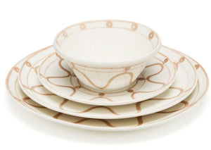 Themis Z’s Serenity Beige Dinnerware Collection includes a hand-painted bowl, salad plate, and handcrafted dinner plate featuring cream ceramic with tan wavy line and dot accents.