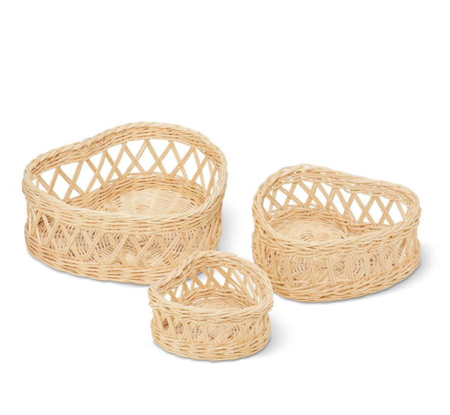 The Aerin Wicker Heart Basket Set features three handcrafted baskets of varying sizes, displayed against a white background.