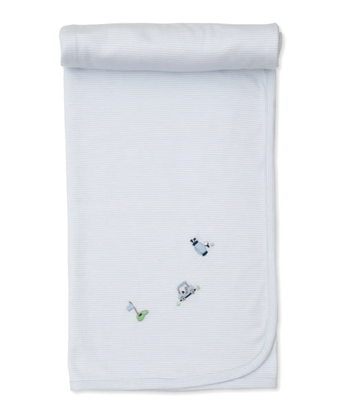 A white Kissy Kissy Pima cotton blanket with embroidered animals on it.
