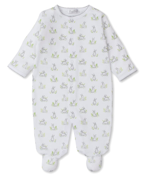 White Kissy Kissy Cottontail Print Footie made of Pima cotton with green frog print, mitten-cuffs, and long sleeves, displayed on a plain background.