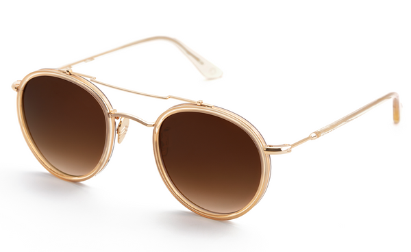 Krewe Porter Sunglasses, 24K Titanium and Champagne with Amber Gradient lenses on a white background.
