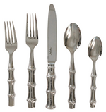 The Juliska Bamboo 5 Piece Flatware Set, Polished, features two forks, a knife, a tablespoon, and a teaspoon with a bamboo-inspired stainless steel design for an elegant table setting.