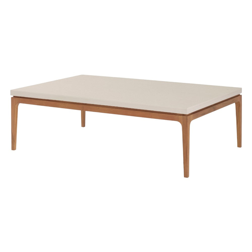 The Sloop Rectangle Cocktail Table by McGuire Furniture features a Bianco Crema Dune top and natural teak frame with four tapered legs—ideal for coastal spaces seeking relaxed charm and natural materials.