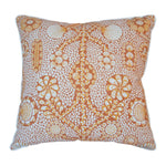 The Burnt Sienna Shell Grotto Outdoor Pillow by Associated Design features an intricate orange and white floral and circular pattern, crafted from premium materials for stylish outdoor décor.