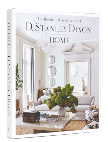 A book titled "Rizzoli Home: The Residential Architecture of D. Stanley Dixon" with a cover featuring an elegant living room interior design inspired by classical architecture.