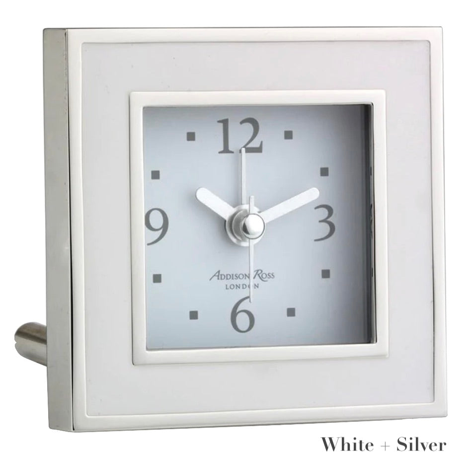 The Addison Ross Silver Square Alarm Clock Collection, featuring a silver square design with a white face and black numerals, displays approximately 10:10. "Addison Ross London" is elegantly printed on its face, making it ideal for your bedside.