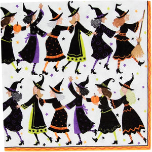 Witches Conga Line by Caspari: Women dressed as witches with pumpkins and a broomstick dance under stars—an enchanting illustration, ideal for Caspari napkins printed in Germany.
