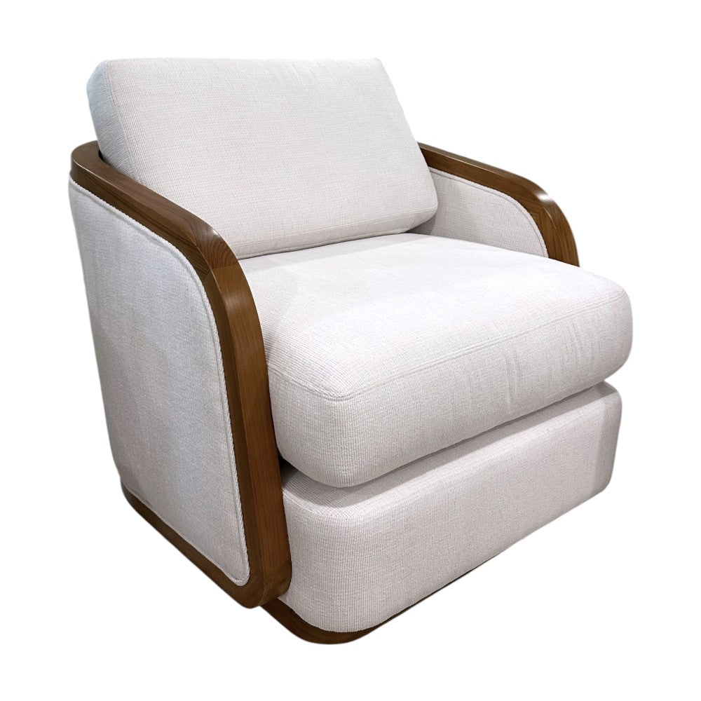 The Schooner Swivel Lounge Chair in Outdoor Ivory Chenille by McGuire Furniture features white upholstery and curved wooden arms and frame, crafted from natural materials, shown against a white background.