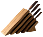 The Messermeister Royale Elite Knife Block Set, 5-Piece, features a wooden block with four German stainless steel kitchen knives, each stored in its own slot.