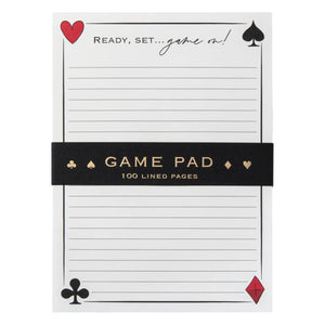 The Karen Adams Game On Notepad has playing card suit corners, lined pages, and "Ready, set...game on!" at the top. An ideal game night essential, it comes with a black band labeled "Game Pad 100 Lined Pages.